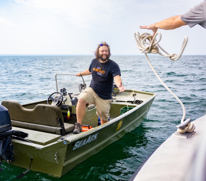 Buffalo State GLC staff working on Lake Erie